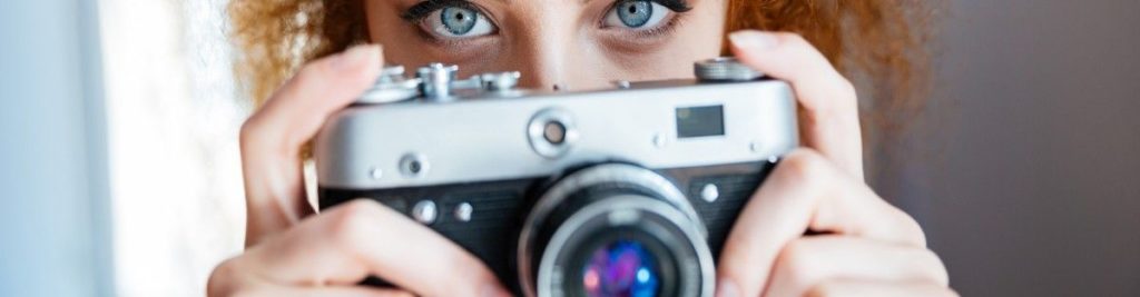 olhos de mulher, câmera fotográfica